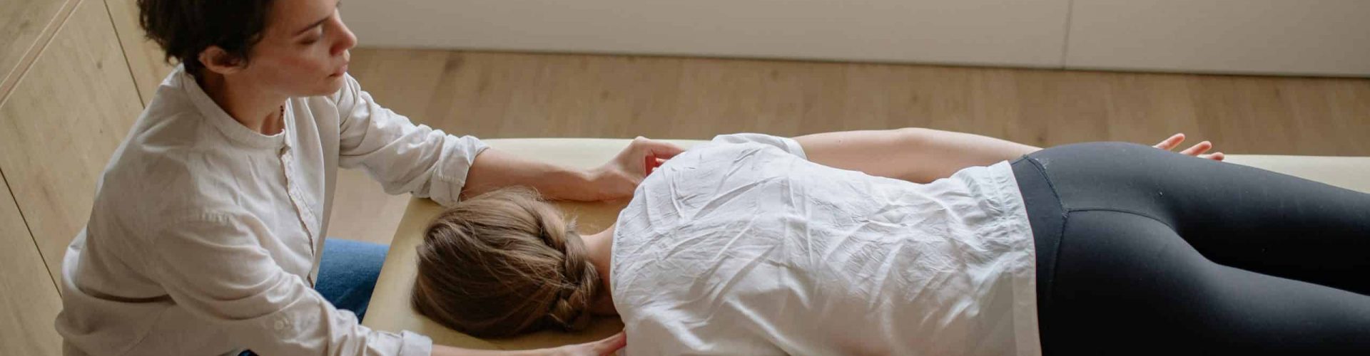 Holistic therapy session with a practitioner providing a relaxing treatment in Tenerife.